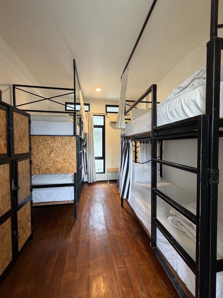Sherloft cozy shared dorm room with polished hardwood floors and sturdy bunk pods